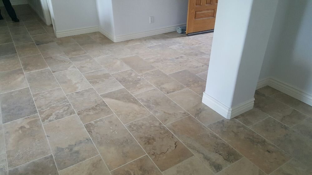 light sandstone tile texture in home walkway