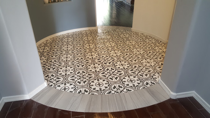 Accent tile circular entry hall with black and white patterned tile