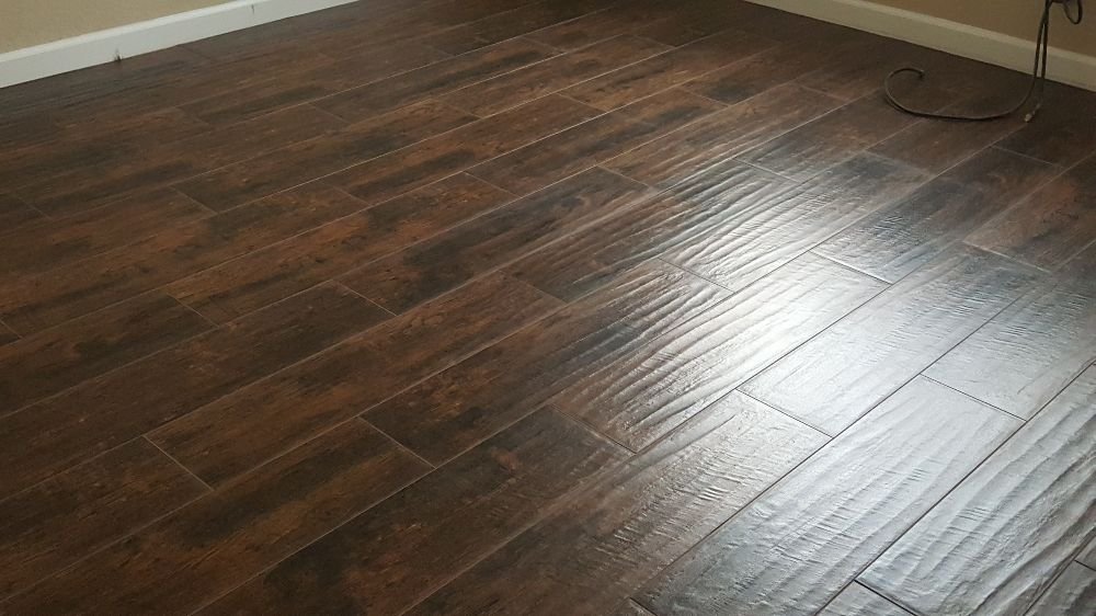 Shiny dark brown luxury vinyl flooring