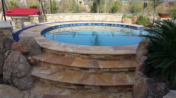 Tile stone stairs leading to hot tub